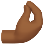 kıstırma hareketi yapan parmaklar: orta koyu cilt tonu